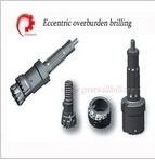 Eccentric overburden drilling tools