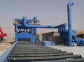 Shot blasting machine with roller