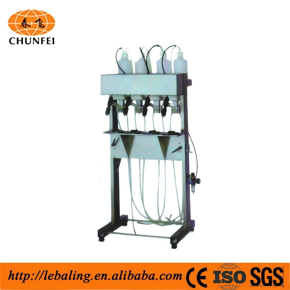 Semi-automatic vacuum filling machine