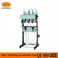 Semi-automatic vacuum filling machine