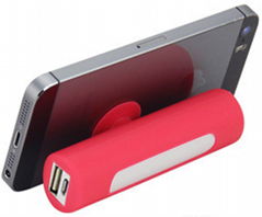 Power bank with mobile phone stand