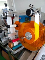 Semi-automatic labeling machine for round bottle 