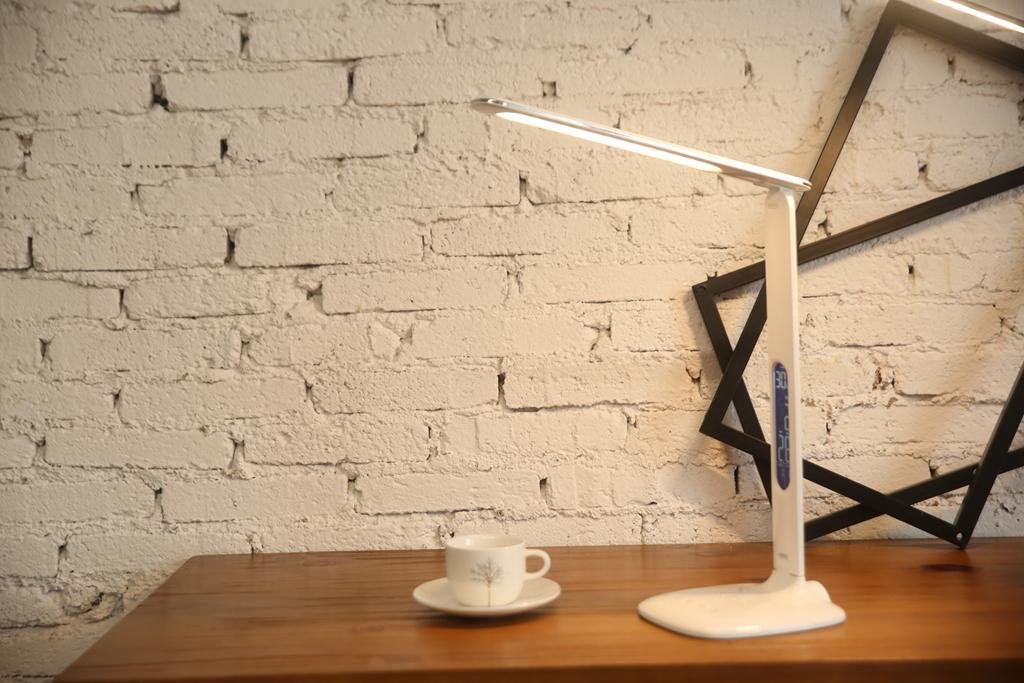 Folding LED desk lamp with LCD calendar and alarm clock