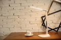 Folding LED desk lamp with LCD calendar and alarm clock 1