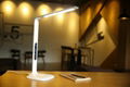 Folding LED desk lamp with LCD calendar and alarm clock