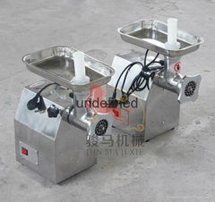 Meat grinding machine