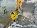 S68 hydraulic stone breaker attached to