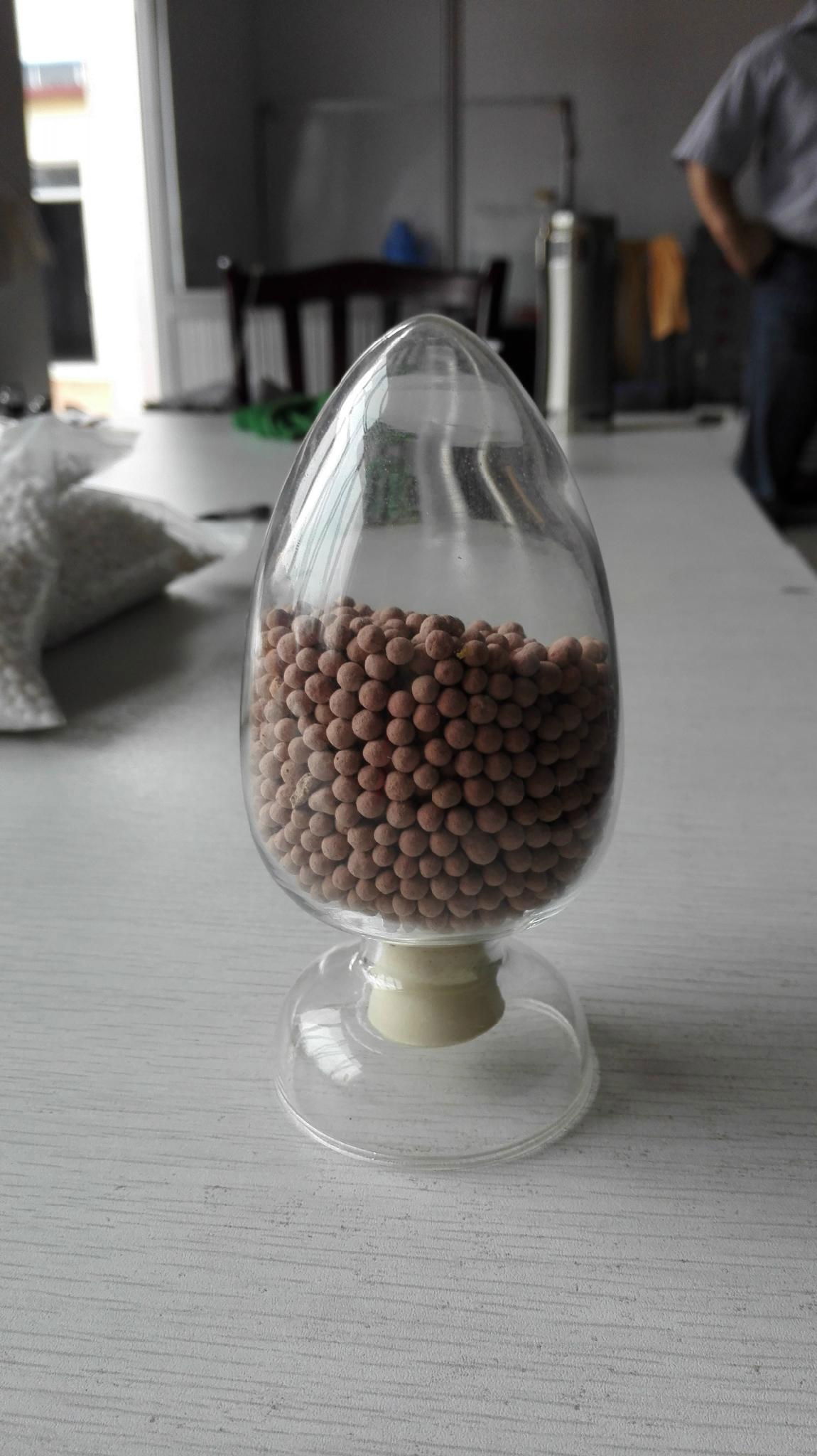 Iron oxide activated alumina