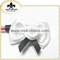 Pre-tied ribbon bow for gift box packaging