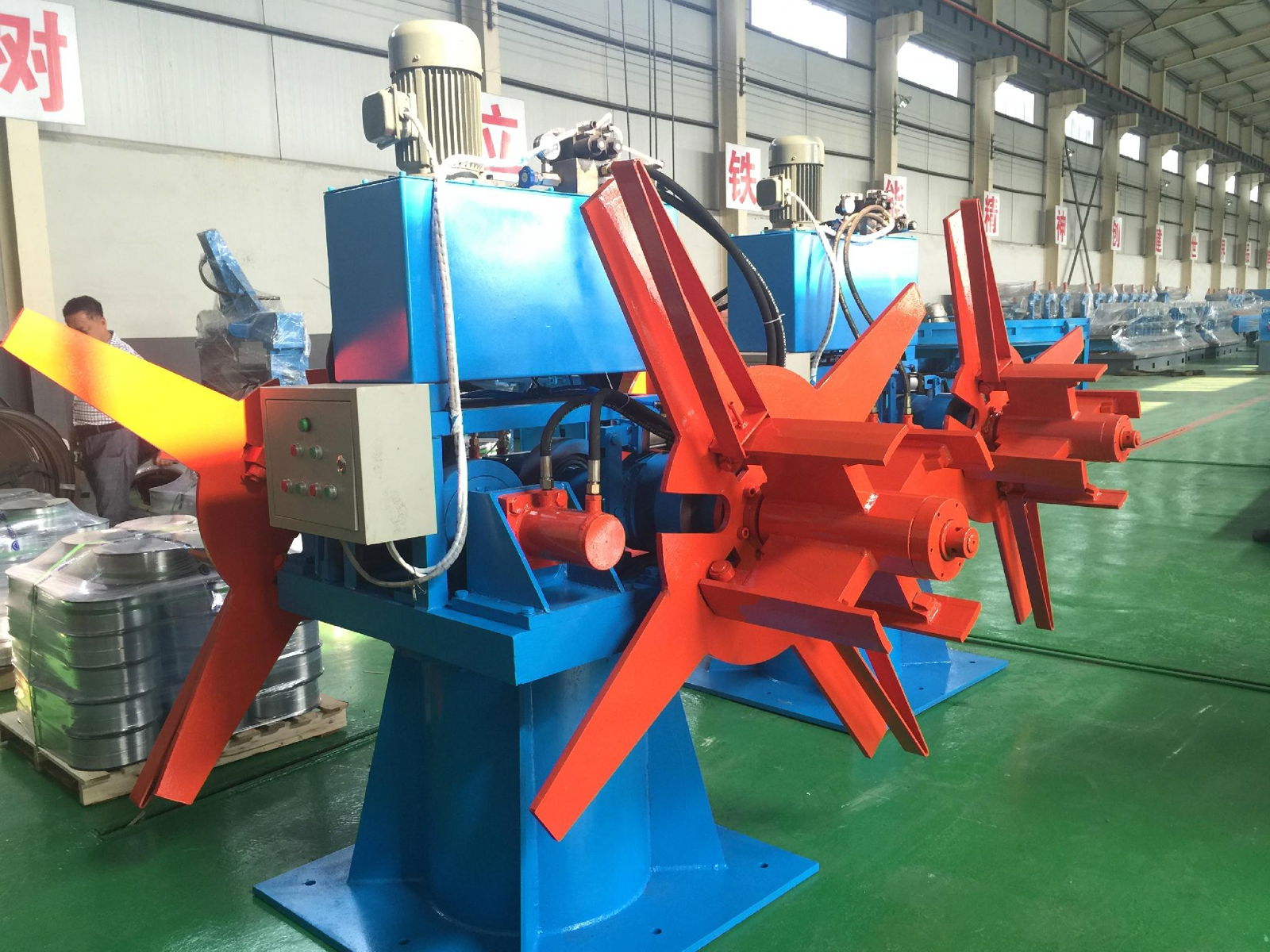 Double head steel strip uncoiler