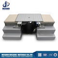 Aluminum expansion joint with safe serrated surface  