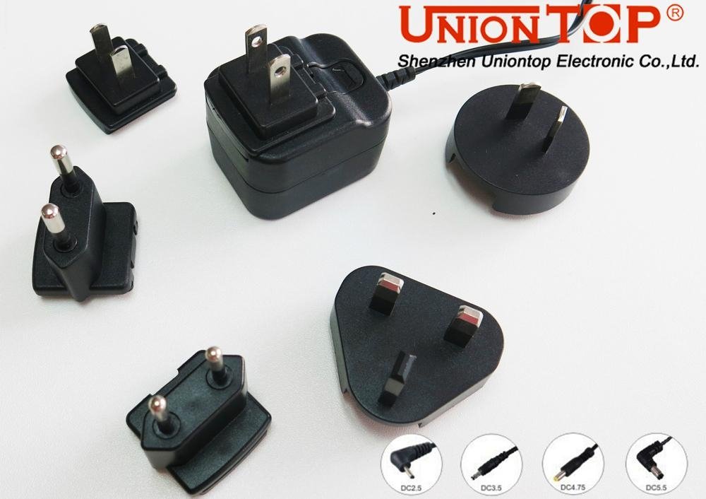 interchangeable plugs universal travel ac dc power adapter