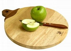 Small apple cutting board with walnut handle.