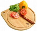Round cutting board with hanging hole and groove