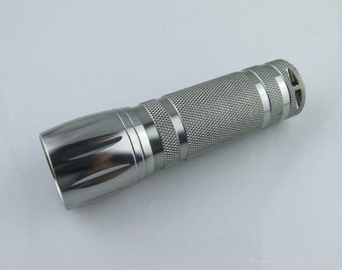 China ningbo flashlight factory wholesale 3AAA high power 1W/3W mini torch  3