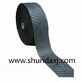 Patterned chevron conveyor belt manufacture