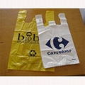 T-shirt bags on block , shopping store usage packaging  2