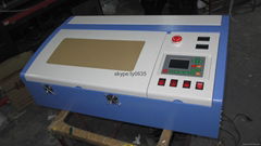 laser engraving machine on wood veneer