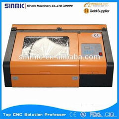 Factory prices!!!Professional SINMIC 3020(300*200mm) 40W CO2 rubber stamp laser 