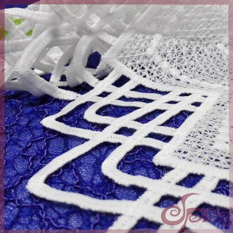 Guipure embroidered lace fabric