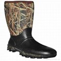 Camo hunting  fishing boots with grass