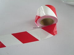 red and white strip barrier tape