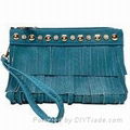 Clutch bags made of PU leather with studs and tassel designs for SS16