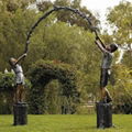 bronze children sculpture of children playing 1