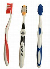 Toothbrush with Tongue Scrapper and Rubber tip massagers on head