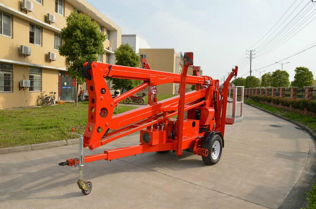 Articulated trailer mounted boom lift