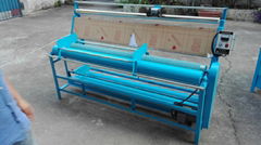 Fabric rolling machine