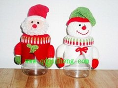 santan and snowman head with plastic bottle for candy