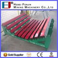 Conveyor buffering bed