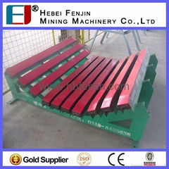 Conveyor buffering bed