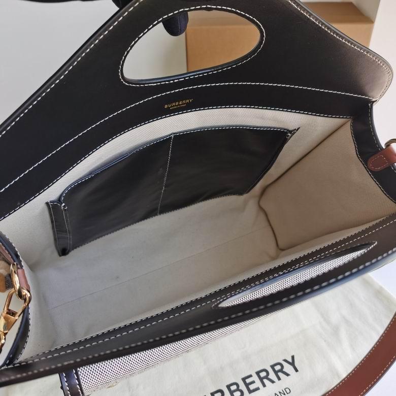 Hot sale          Medium Two-Tone Canvas and Leather Pocket Bag   14
