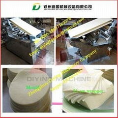 Automatic dumpling skin making machine