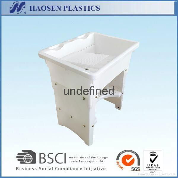 white plastic laundry sink