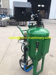 Dustless blasting machine