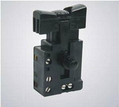 Ac trigger switch with speed control and integrated reversing module 