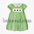 Lovely pumpkin girl smocked dress for