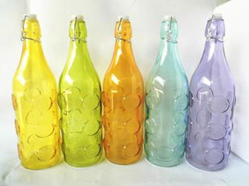 Glass bottle with colored and chrysanthemum stamp