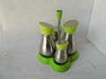 Glass color matching salt and pepper grinders and bottle rack with stainless ste