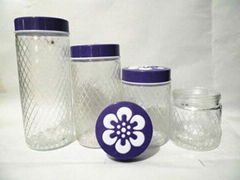 Glass canister storage bottle with plastic lids