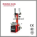Semi automatic swing arm tire changer