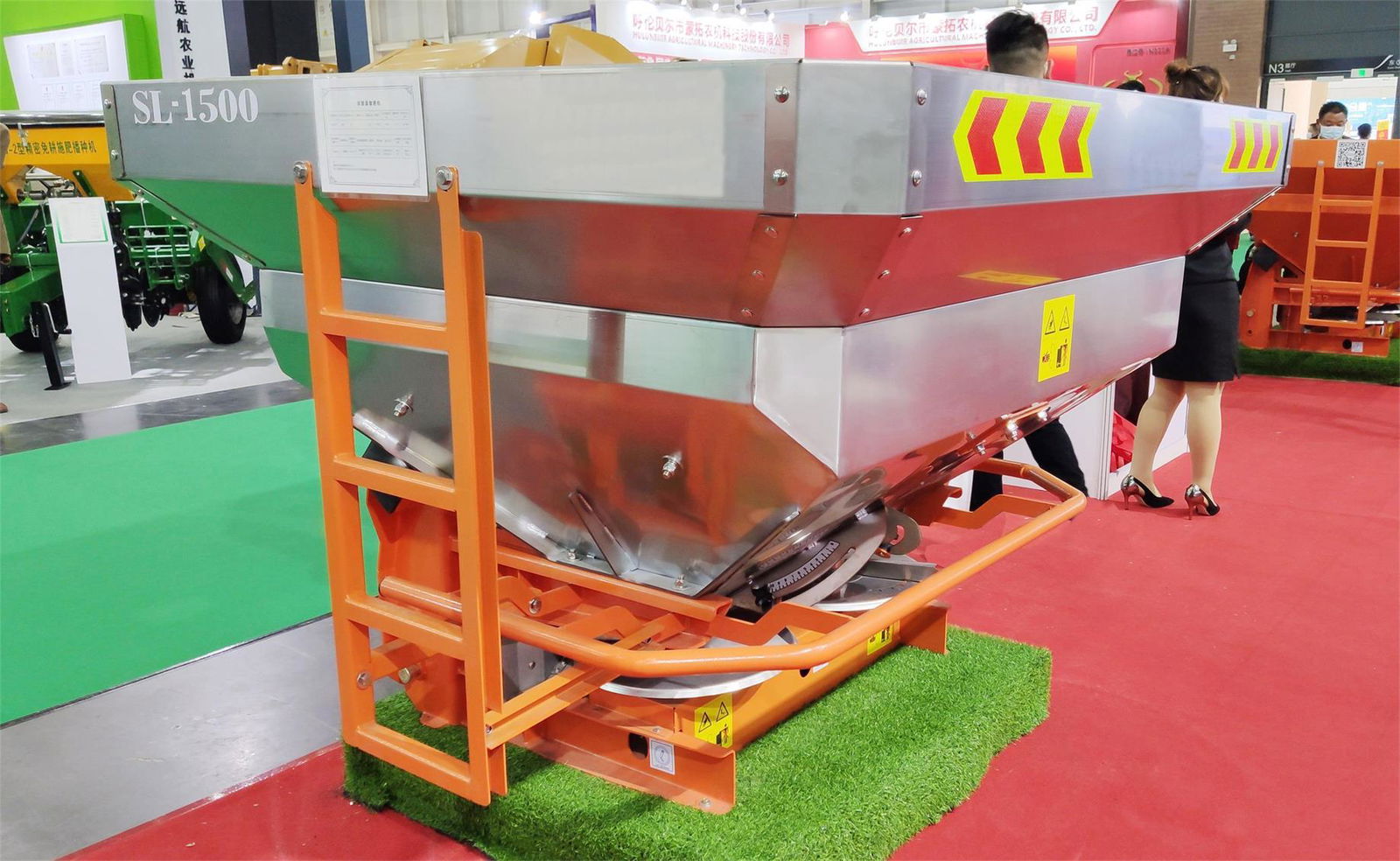 Tractor mounted fertilizer spreader