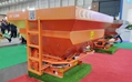 Tractor mounted fertilizer spreader