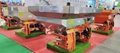 Double disc hydraulic motor drive spreader