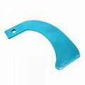 Rotary blade for ridge plastering