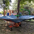 Tractor mounted Fruit tree shaker used collect umbrella