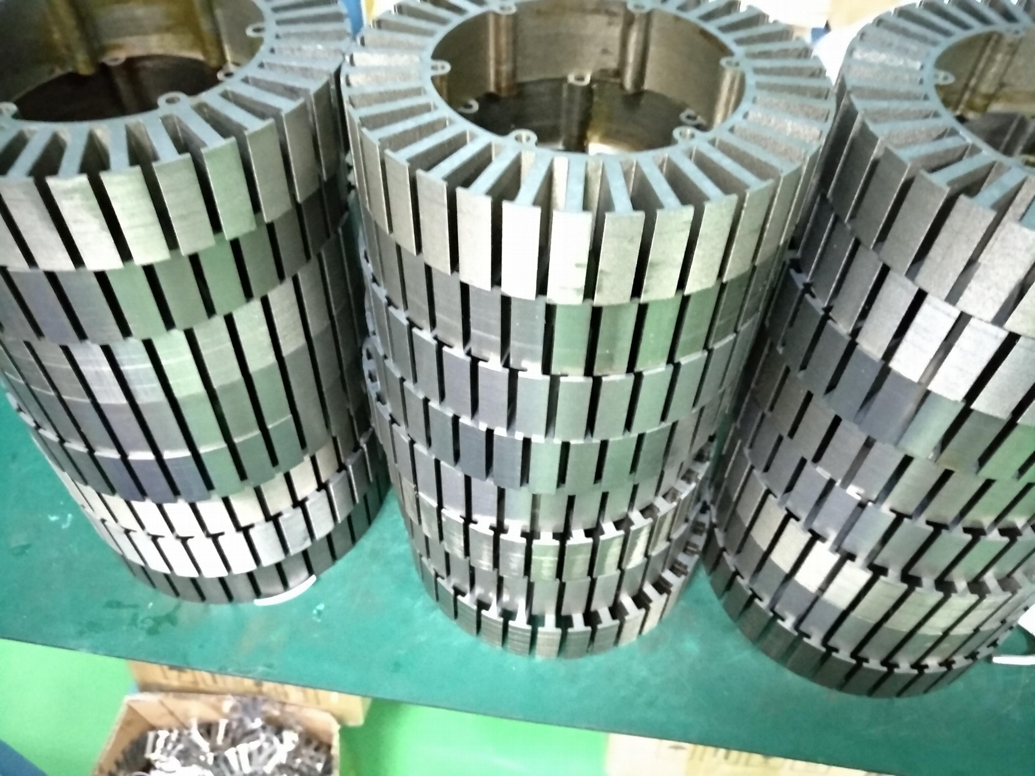 Bonded stator and rotor motor stamping lamination with high temperature